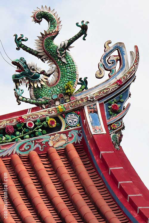 goddess of mercy temple roof detail dragon sculpture - George Town Malaysia