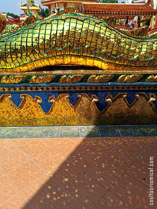 Mirror fragments covering dragon statue at one of the most beautiful Penang temples