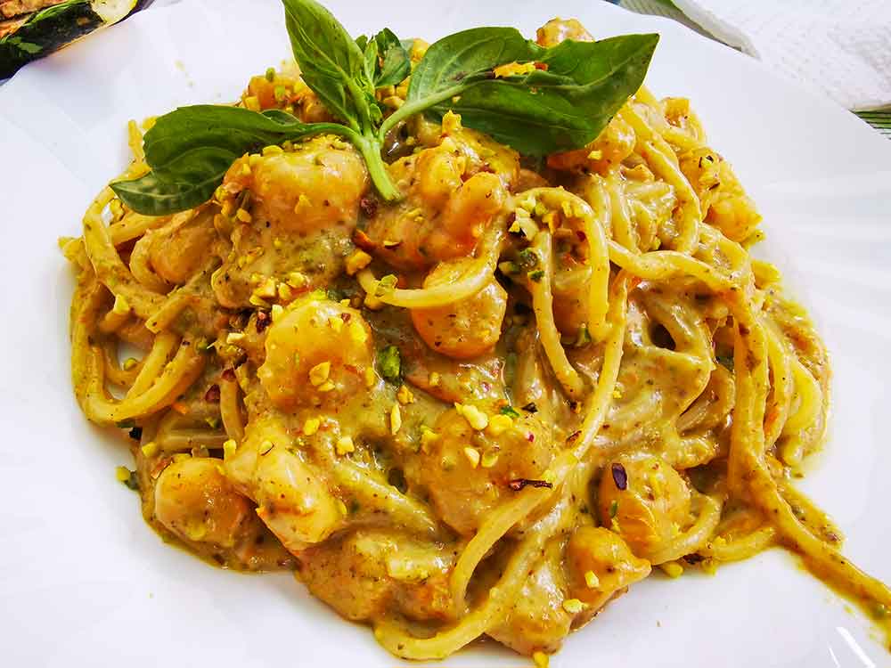 Italian spaghetti with shrimps street food in Ancient Market of Ballaro