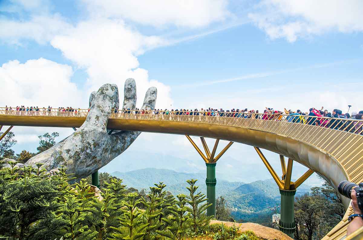 Golden Bridge in Sun World Ba Na Hills Vietnam on a clear day